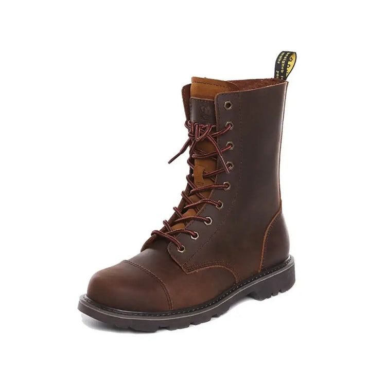 Side view of a brown leather lace-up combat boot with dark brown toe cap, red laces, metal eyelets, and yellow pull tab against a white background."