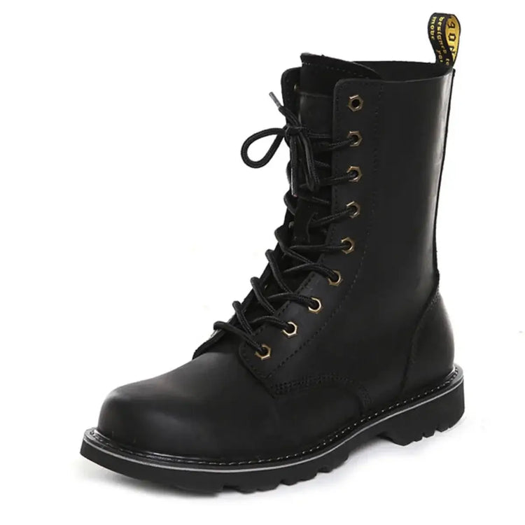 Side view of a black leather lace-up combat boot with distinct black toe cap, metal eyelets, and yellow pull tab against a white background.