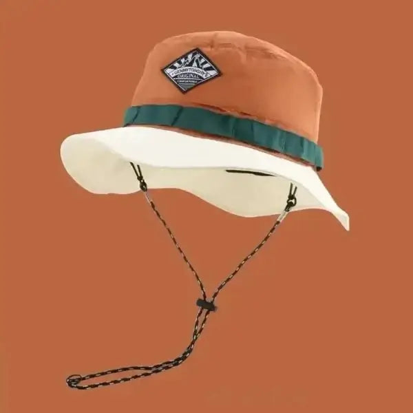 Unisex orange and white wide brim bucket hat with adjustable chin strap for sun protection