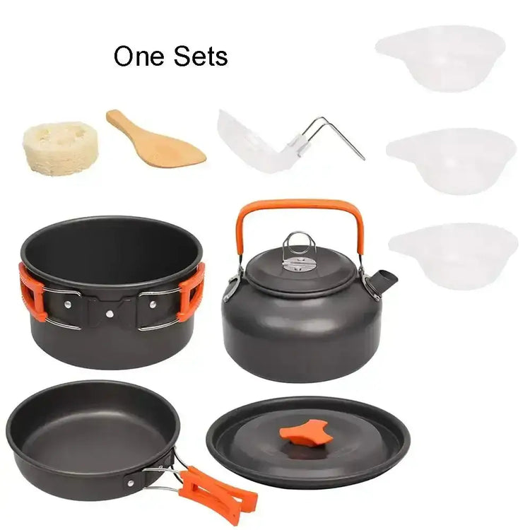 Camping non stick cookware set with pots, pans, kettle, and utensils for outdoor cooking.