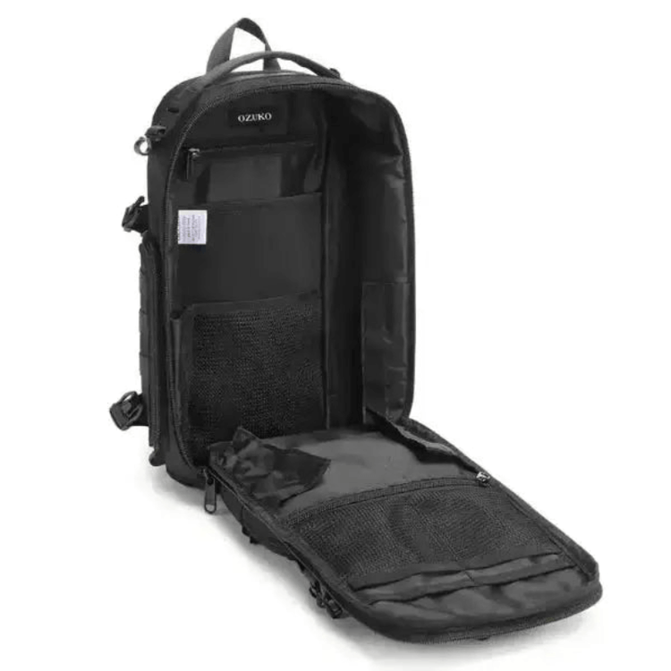 I opened the black Ozuko crossbody sling backpack, which shows ample capacity storage with multiple compartments and pockets for organization.