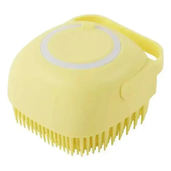 Yellow dog brush with built-in shampoo dispenser for grooming, shedding, and massaging pets, suitable for both cats and dogs