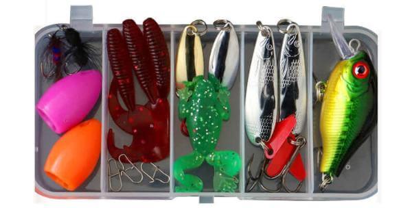 Comprehensive fishing tackle kit with diverse lures including soft baits, frogs, poppers, and crankbaits in a double-layered fishing tackle box.