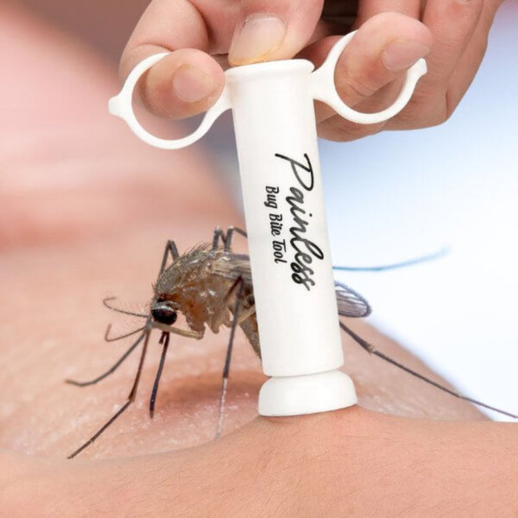 Painless Bite Relief Extractor being used on a mosquito bite for instant relief and itch reduction