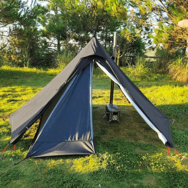 Ultralight Tipi Pyramid Hot Tent with built-in stove jack, perfect for solo winter camping and bushcraft.