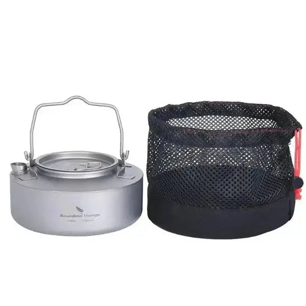 Titanium camping kettle with handle and black mesh carrying bag, perfect for camping cooking equipment and outdoor kitchen gear.