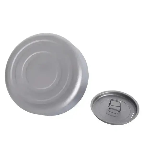 Durable titanium camping kettle and lid, essential for camping kitchen equipment and outdoor cooking gear.