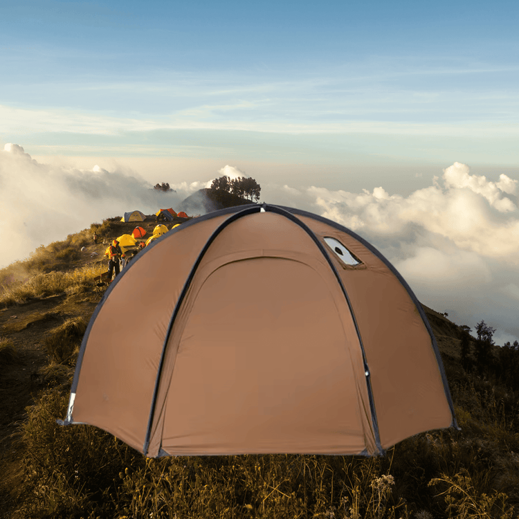 Brown tent on a mountain with other tents and people in the background