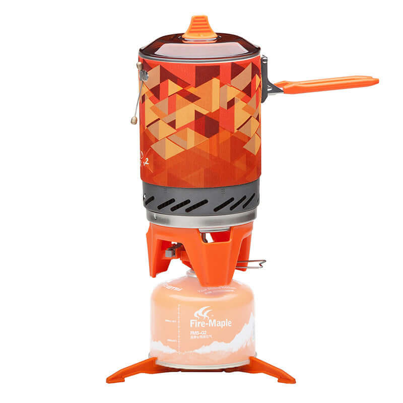 Fire Maple jet boil camp stove system with vibrant orange design, compact and efficient for outdoor cooking.