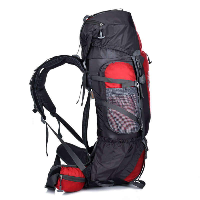 Large black and red lightweight hiking backpack with waist strap and external frame, ideal for travel and outdoor adventures.