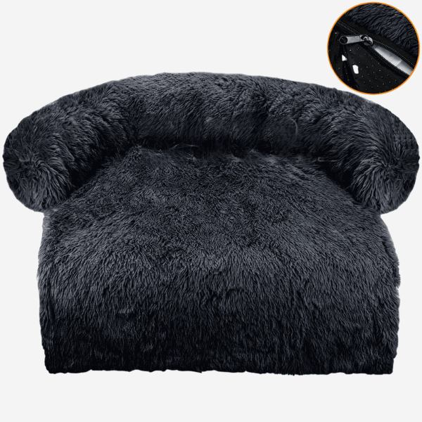 Black dog bed with arched backrest, white background.