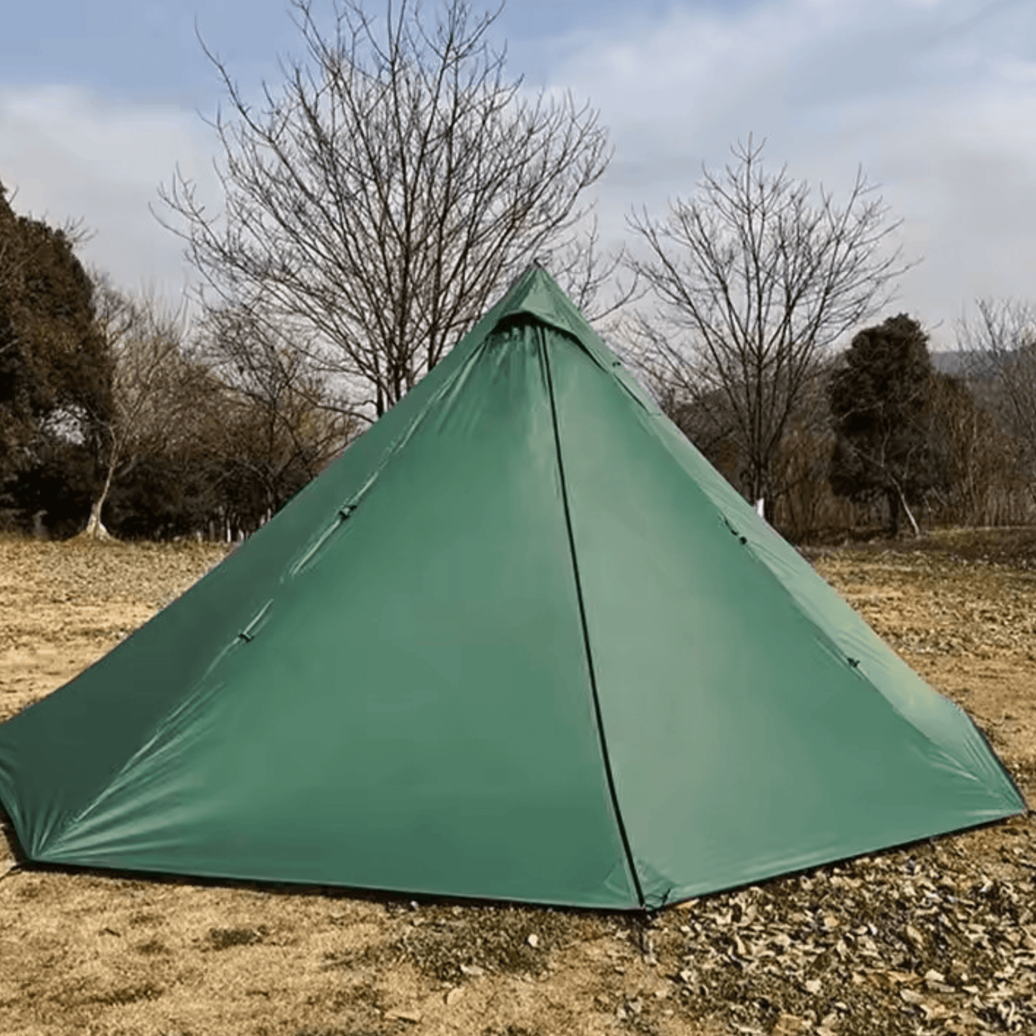 Hot Tent backpacking and Camping – durable green 4-season tent with stove jack, ideal for 2–4 people in various outdoor settings.