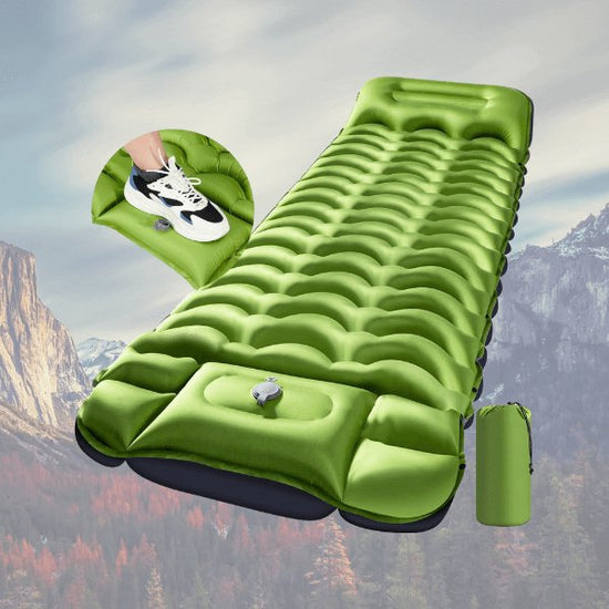 Premium green camping sleeping pad with built-in inflator pump, shown with repair kits and storage bag, ideal for hiking and outdoor use.