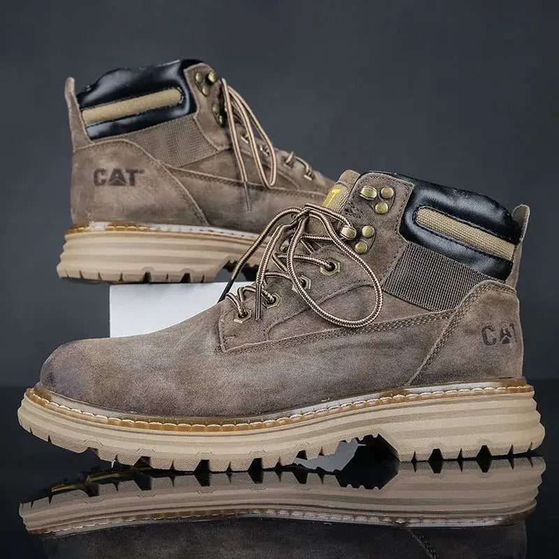 Pair of gray suede Caterpillar Martin lightweight waterproof hiking boots with lace-up closure, dark brown trim, light rubber sole, and &