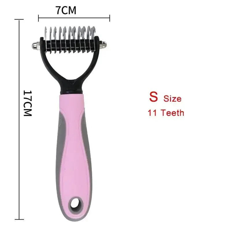 Pink pet hair brush with measurements, small size, white background.