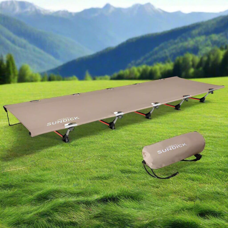 A portable camping cot with a compact carrying bag