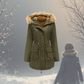 Green parka coat with fur-lined hood on a snowy background