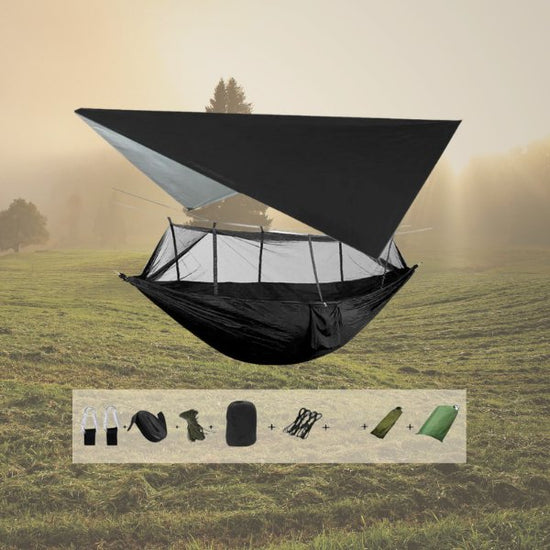 Portable camping hammock with mosquito net and rain tarp made of 210T Parachute nylon fabric for bug-free lounging.