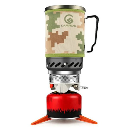 Portable backpacking gas stove with camouflage pot and red fuel canister for camping and outdoor cooking.