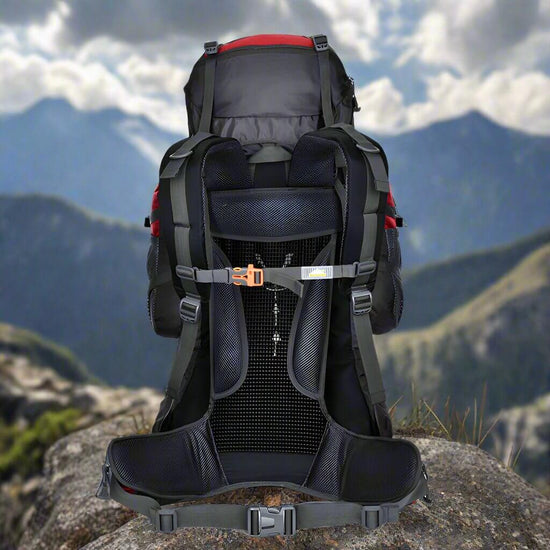 Large lightweight hiking backpack with waist strap, 55-75L capacity, on a mountain background. Durable and water-resistant.