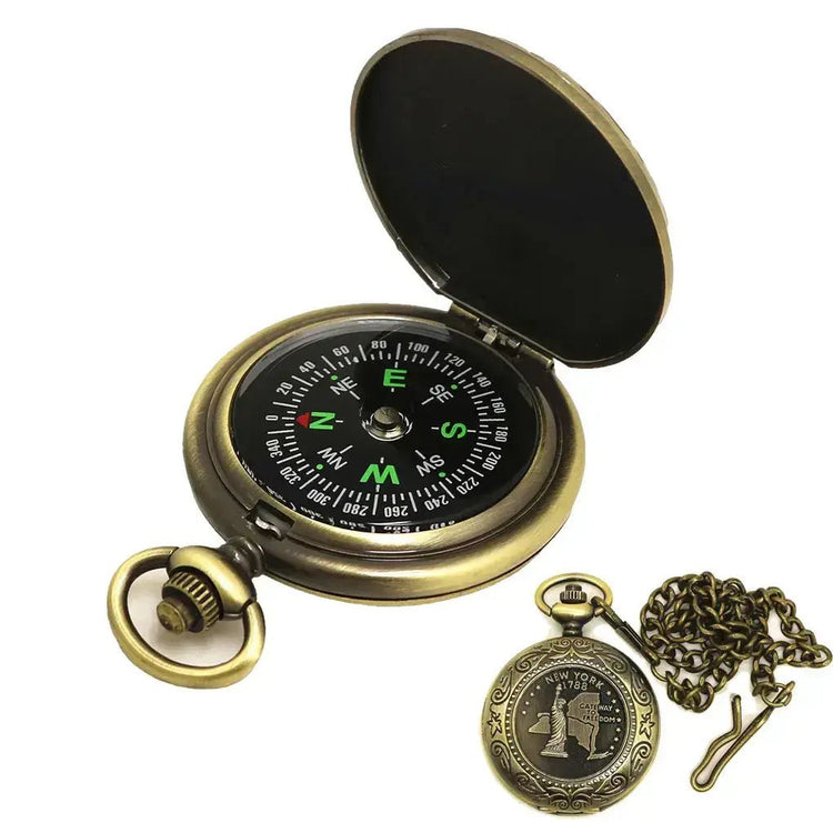 Antique-style portable military compass with luminous dial, chain, and integrated bubble level, ideal for camping and survival activities.