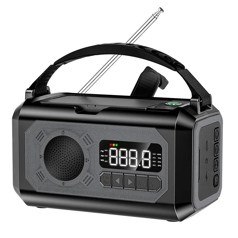 Red radio with solar, electric, and hand crank charging, holding strap, white background.