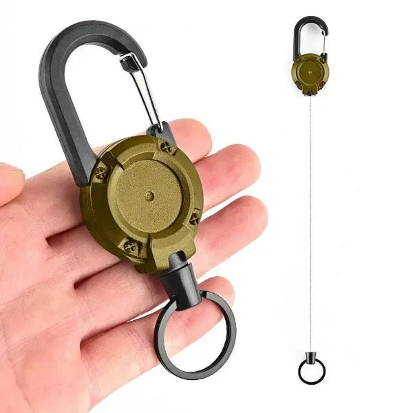 Anti-theft metal yoyo retractable keychain white background on a presentation on the palm of a hand.