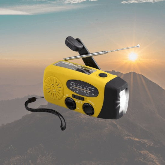 yellow Hand crank radio with antenna, power bank, flashlight, solar charging, white background, charging mobile.