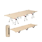 Lightweight aluminum beige folding sleeping cot, collapsible design with durable fabric and carrying bag.