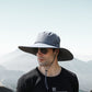 Gray wide brim safari hat for men with sun protection, perfect for outdoor activities like fishing and hiking in summer.