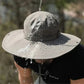 Gray wide brim waterproof safari hat for men with water-repellent fabric, perfect for summer outdoor activities like fishing and hiking