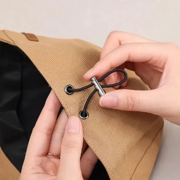 Adjusting black drawstring on a women&