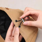 Adjusting black drawstring on a women&