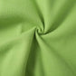 Close-up of soft green polyester fabric with a cozy texture, perfect for Women&