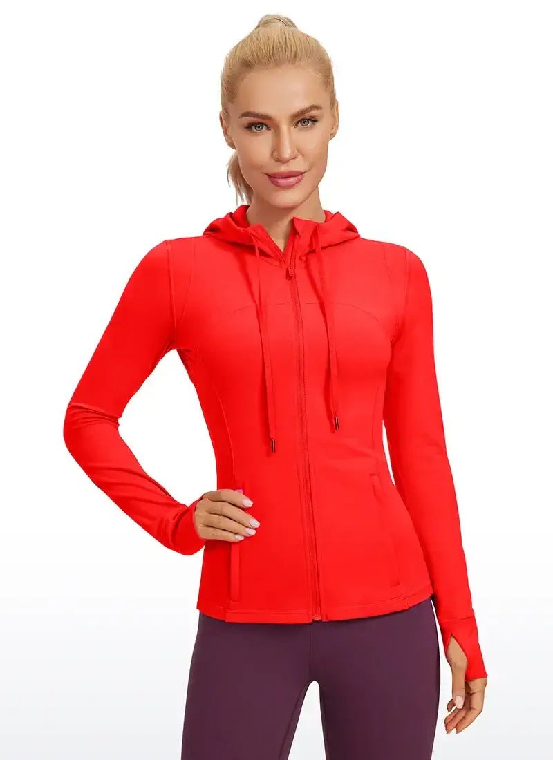 zip-up hoodie women in red, featuring a zip-up design, thumb holes, and breathable fabric for athletic performance and comfort.