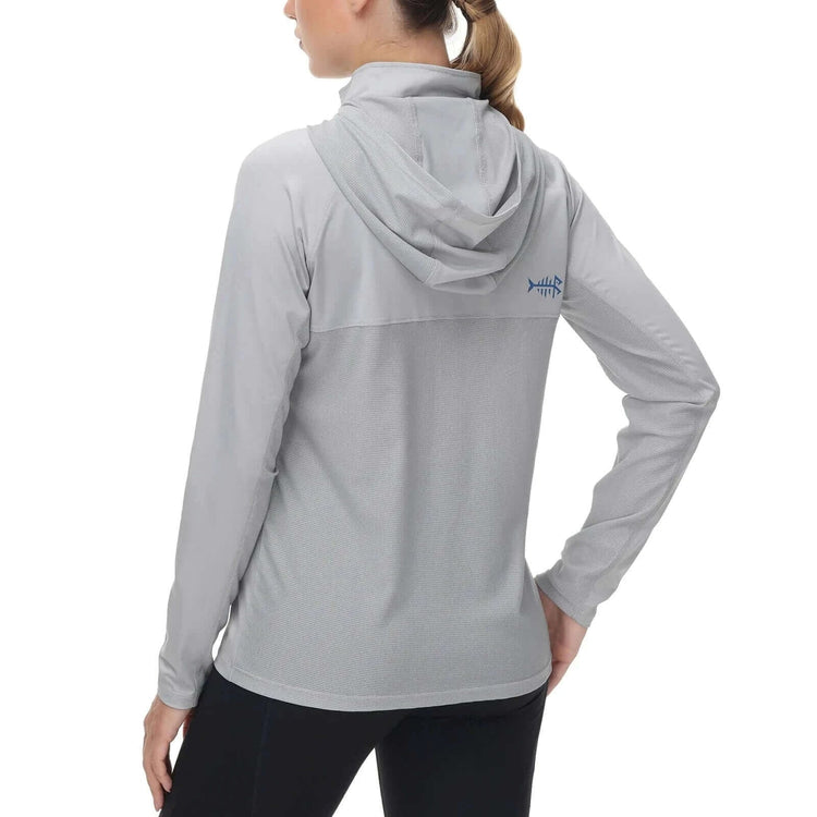 Woman wearing Women’s UPF 50+ Performance Hoodie showing back view in grey, long-sleeved lightweight pullover for outdoor activities.